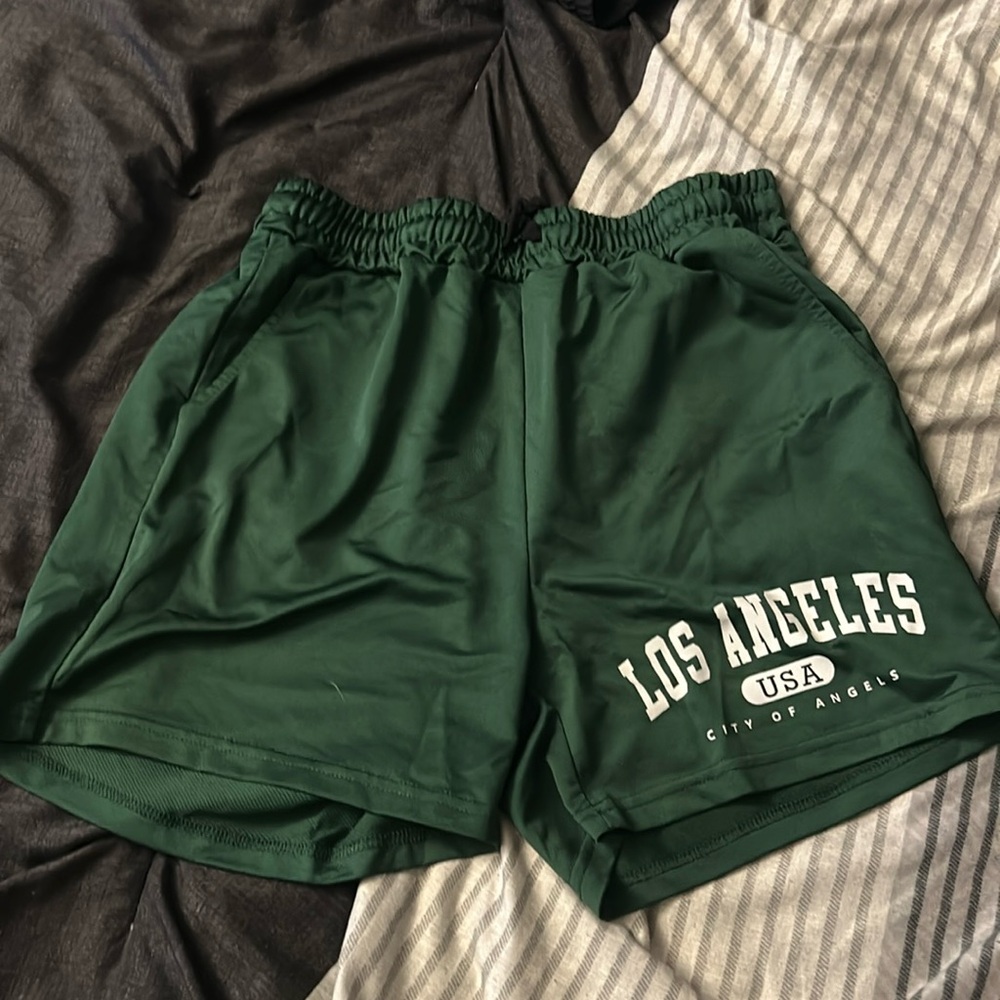 Size small dark green SHEIN shorts.